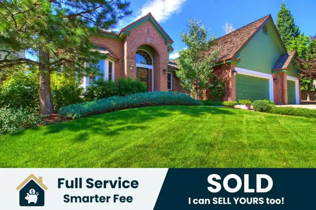 Brick house with sold sign and full service offer.