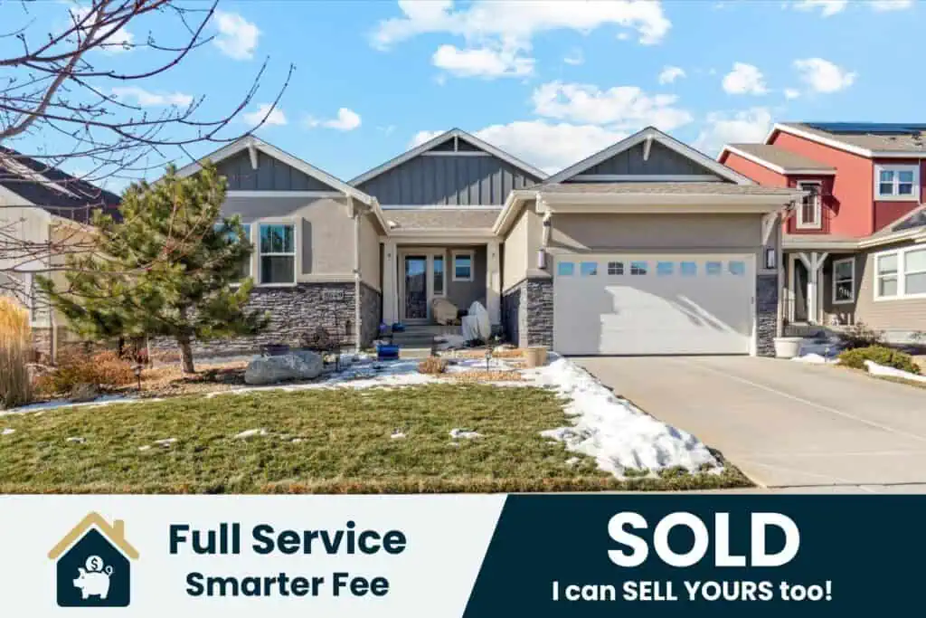House with Sold sign and real estate services advertisement.