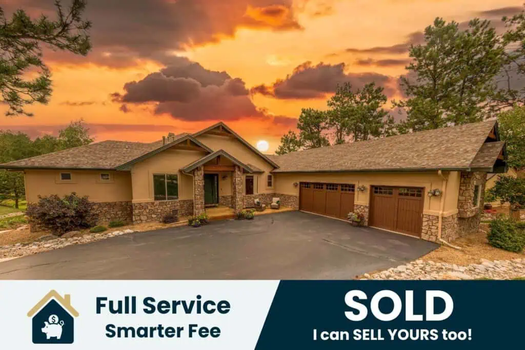 House with sunset, sold banner.