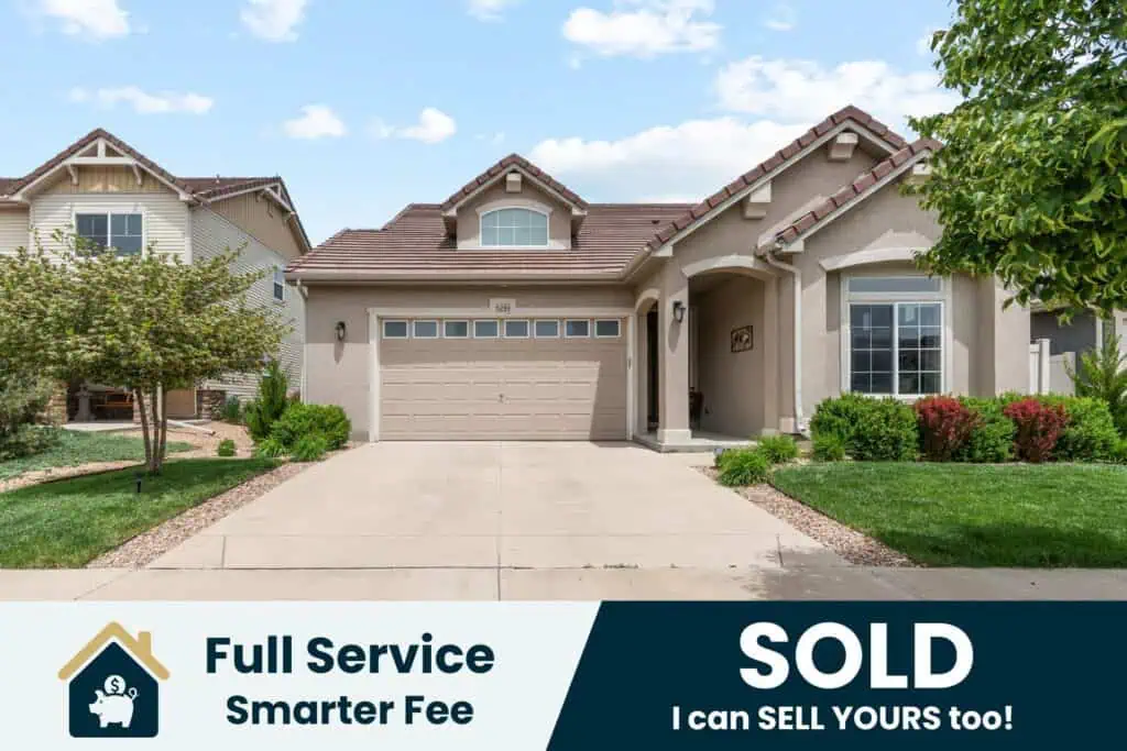 Modern house with sold sign advertisement