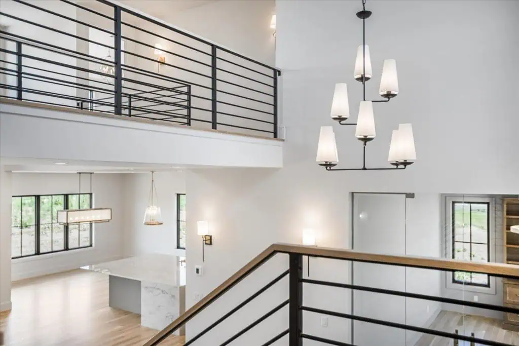 Modern open-concept interior with elegant chandelier