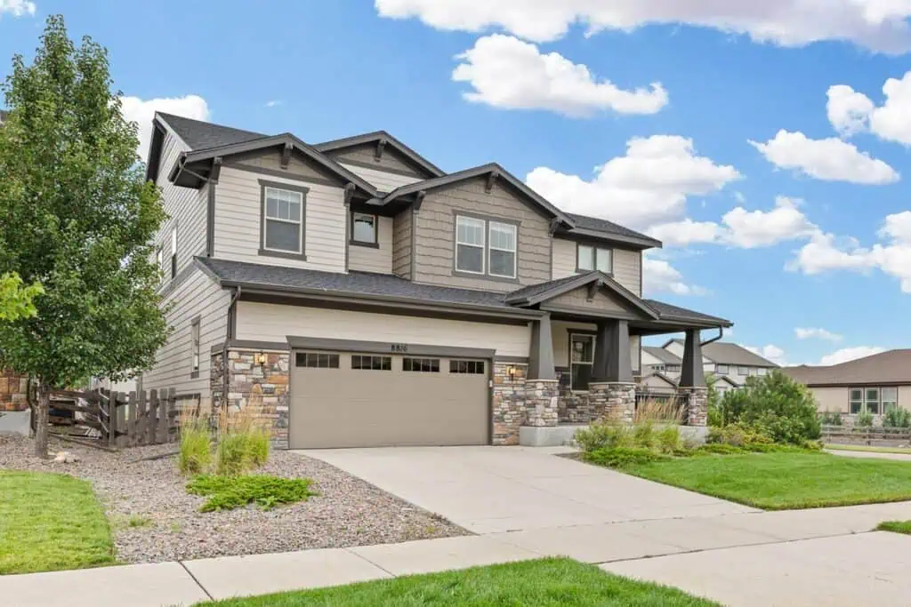 Two-story modern suburban house with a garage